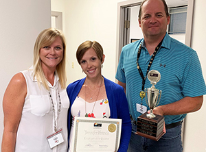 Employee of the Third Quarter 2019, Jennifer Francis, with Tax Collector Ken Burton and Director Michele Schulz