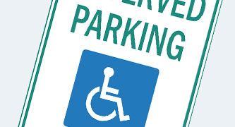 Reserved parking sign with wheelchair symbol